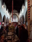 Lots of ringers treasure hunting in Halesworth church at the Guild Social.