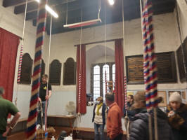 Inside Waltham Abbey ringing chamber whilst the tenor is rung up.