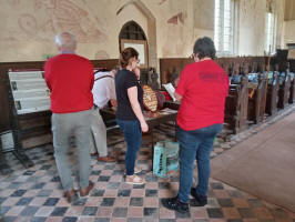 Some of the Pettistree band signing the book after ringing.