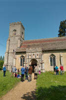 Outside Troston church listening to the ringing.
