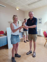 Amanda Richmond presenting the Call Change Trophy to Richard Rapior of Aldeburgh.