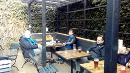  Paul Bray, George Vant, David Potts and Mason enjoy refreshments in The Masons Arms’ beer garden.