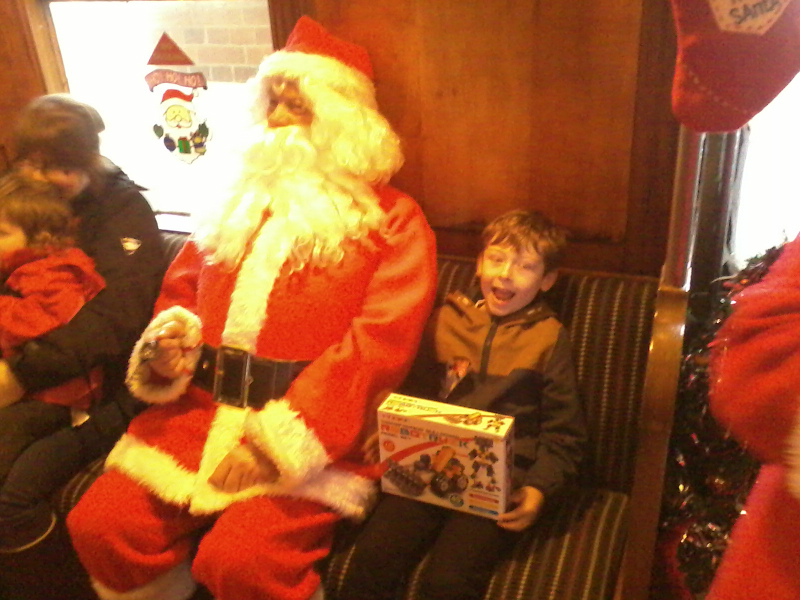 Mason meets Father Christmas.