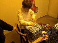 Mason rips into some of his birthday presents.