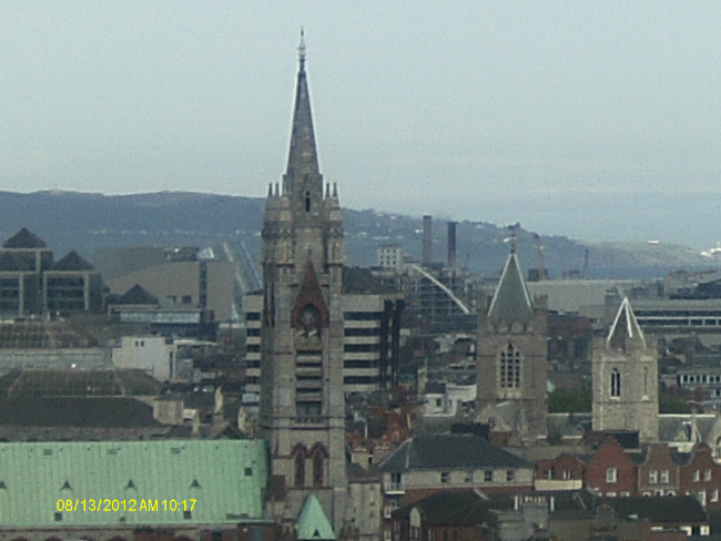 Towers of John's Lane (10 bells) on the Left and Christ Church Cathedral (16 bells) in the Middle From The Gravity Bar.