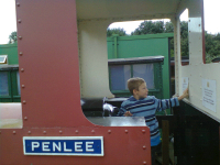 Mason enjoying being a train driver at the Leighton Buzzard Narrow Gauge Railway.