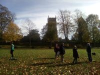 Socialising at distance in Christchurch Park beneath the tower of St Margaret’s following ringing at St Mary-le-Tower.