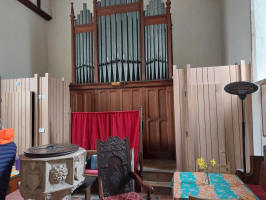 The new facilities at Hasketon either side of the organ. The entrance to the ringing chamber is now hidden behind the construction on the right hand side. Taken by Ruthie