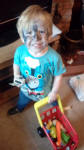 Alfie with his face painted.