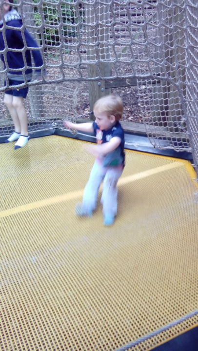 Alfie on the trampoline at Chatsworth House's adventure playground.