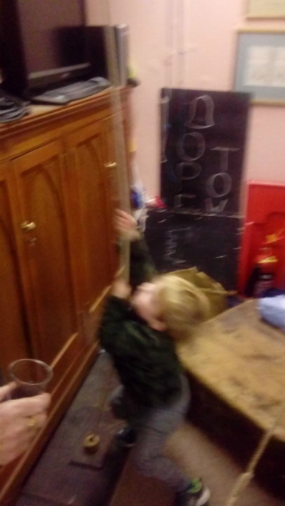 Alfie trying to chime the service bell.