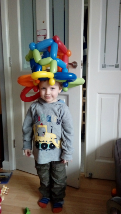 Alfie in his giant balloon hat.