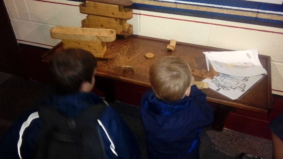 Mason & Alfie constructing a tram.