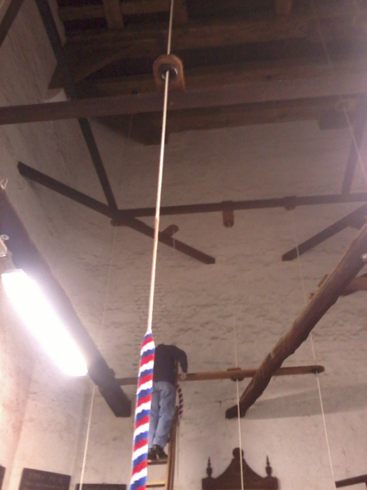 Derek Rose threading the second rope back through the guides at Lavenham.