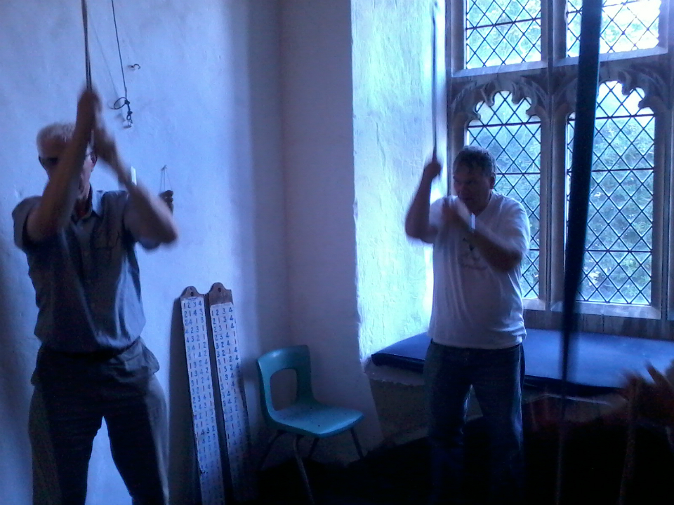  Jim Crabtree (on 3rd) and Mike Dew (on tenor) ringing at Graveley on Rambling Ringers Tour.