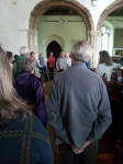 Guild Patron George Vestey addresses the crowds before the draw in Polstead church.