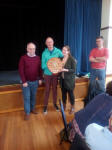  Mark Ogden & Ruth Munnings receive the Mitson Shield on behalf of the Pettistree band from Brian Meads at Polstead Village Hall.