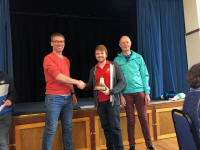 Neal Dodge accepting the Lester Brett Trophy on behalf of the Great Barton Band.