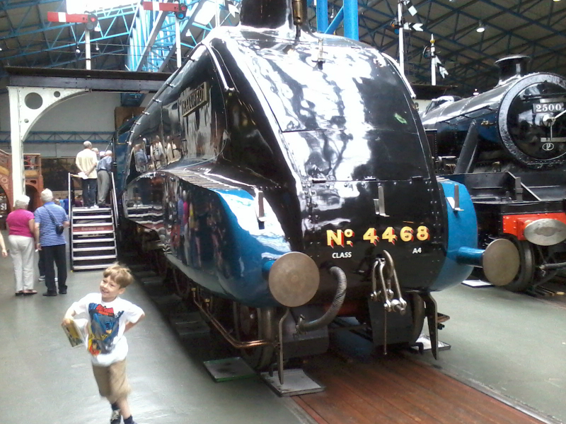 Mason enjoying the National Railway Musuem in York in front of the Mallard.