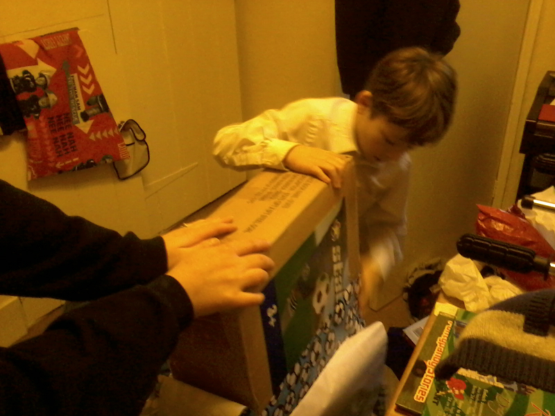 Mason rips into some of his birthday presents.
