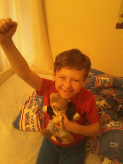 Mason with the class bear Alvin.