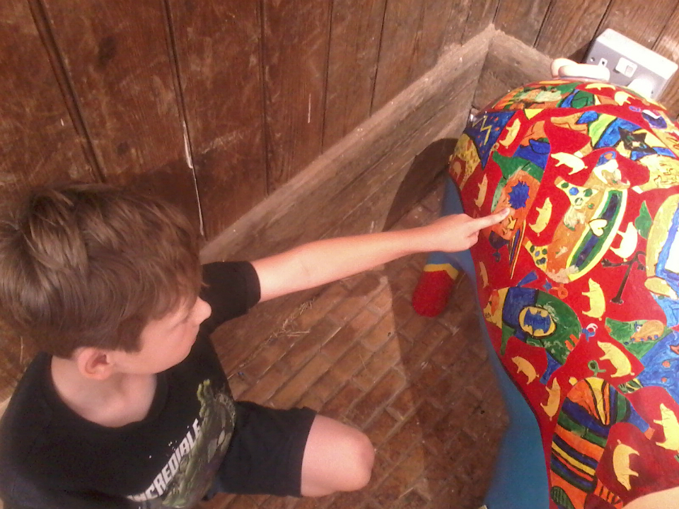 Mason pointing out the bit he painted on Pigasus!