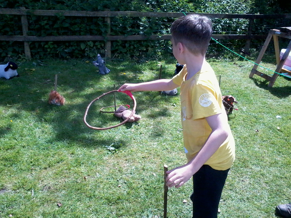 Mason throwing hoops.