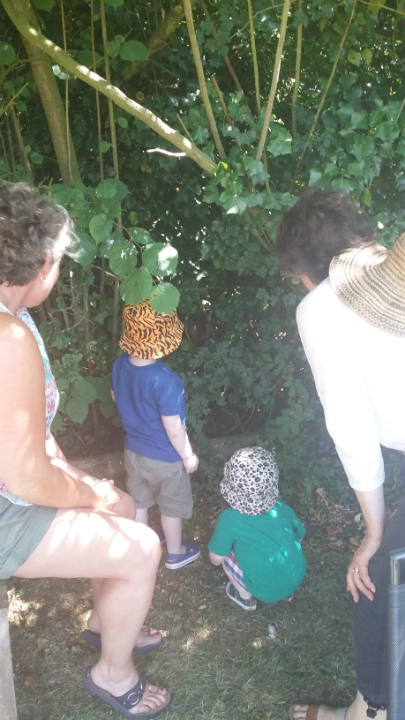Alfie & Joshua help in the hunt for lost boules at the Offton BBQ.