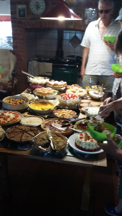 A table-full of puddings in the kitchen at the Offton BBQ.