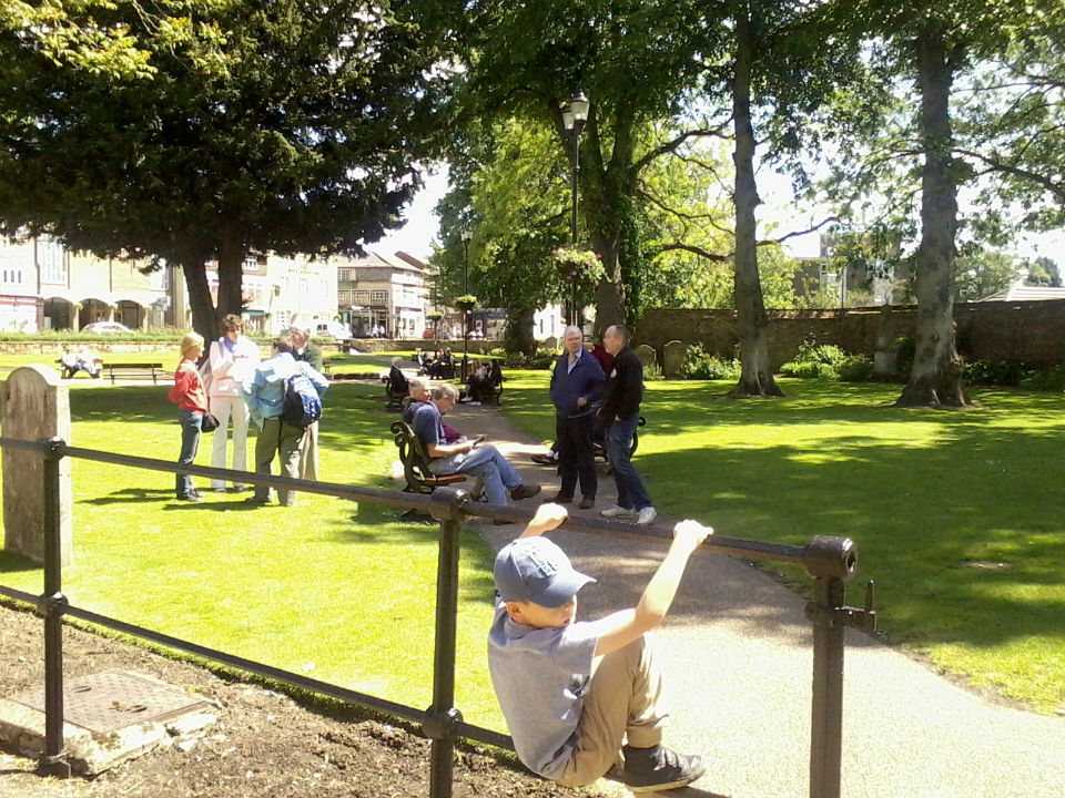  Listening in the churchyard.