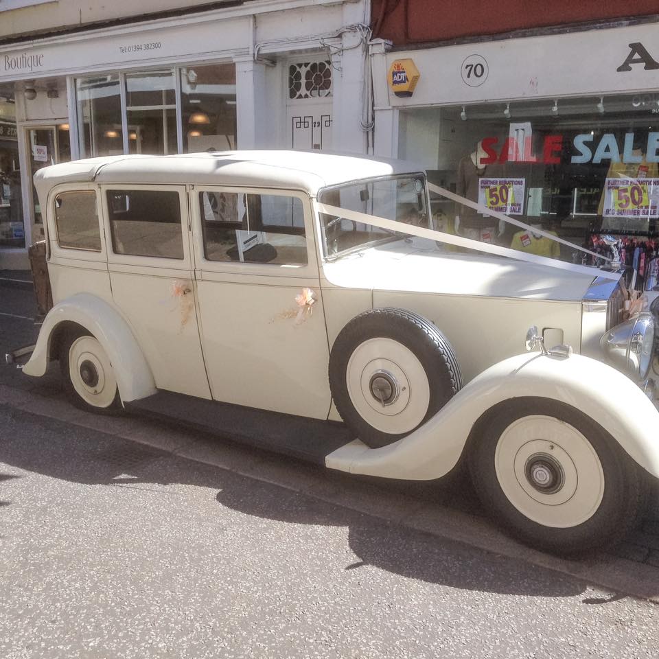 The wedding car with a flat tyre.