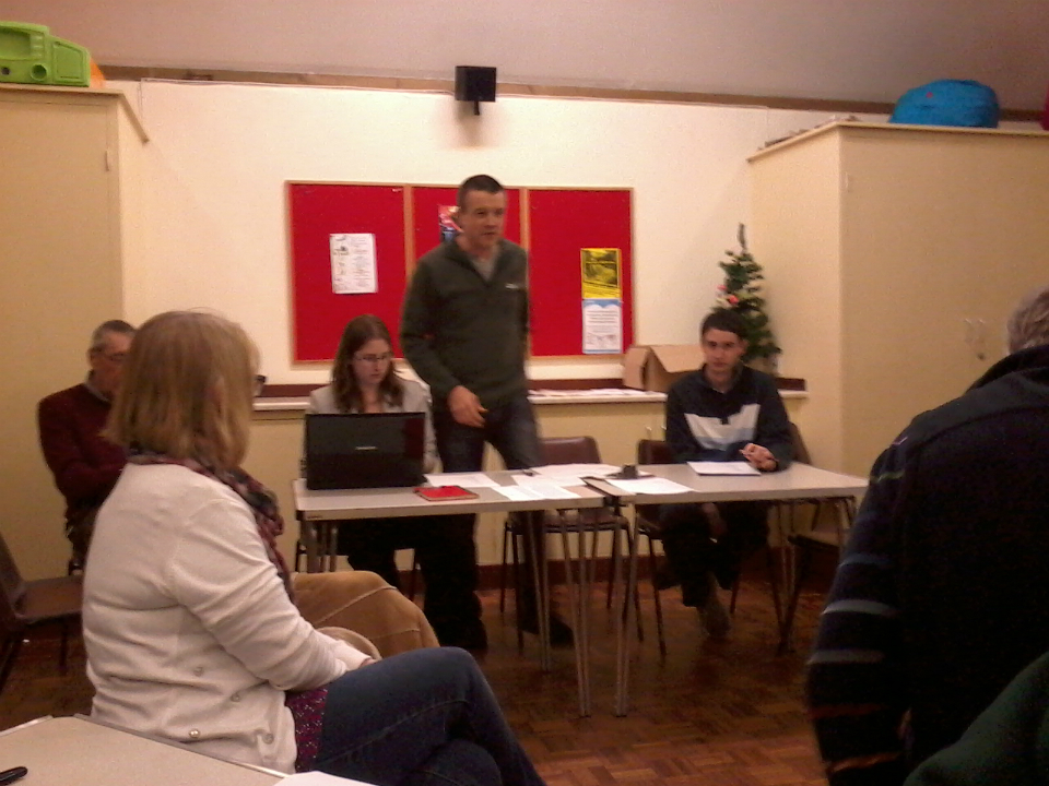 The South-East District Top Table as it was for the last time. l to r; Eric Brown (Treasurer), Ruth Munnings (Secretary), Ralph Earey (Chairman) and Tom Scase (Ringing Master).