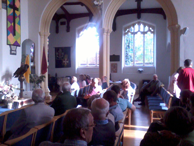 Gathering for the results back in the church.