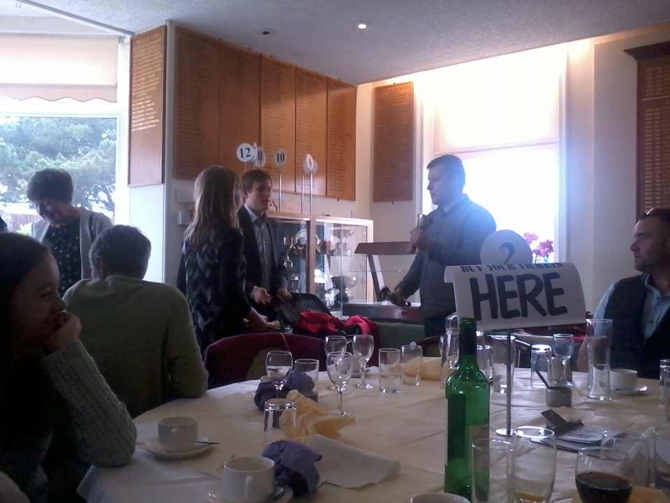 Handbell ringing at the St Mary-le-Tower Dinner. l to r - Laura Davies, Louis Suggett and George Vant.