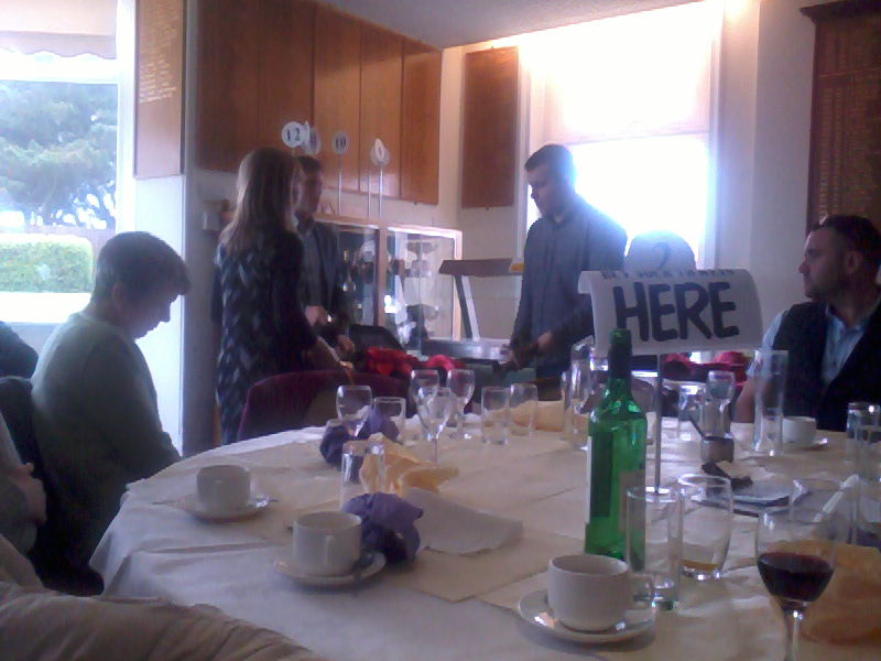 Handbell ringing at the St Mary-le-Tower Dinner. l to r - Laura Davies, Louis Suggett and George Vant.