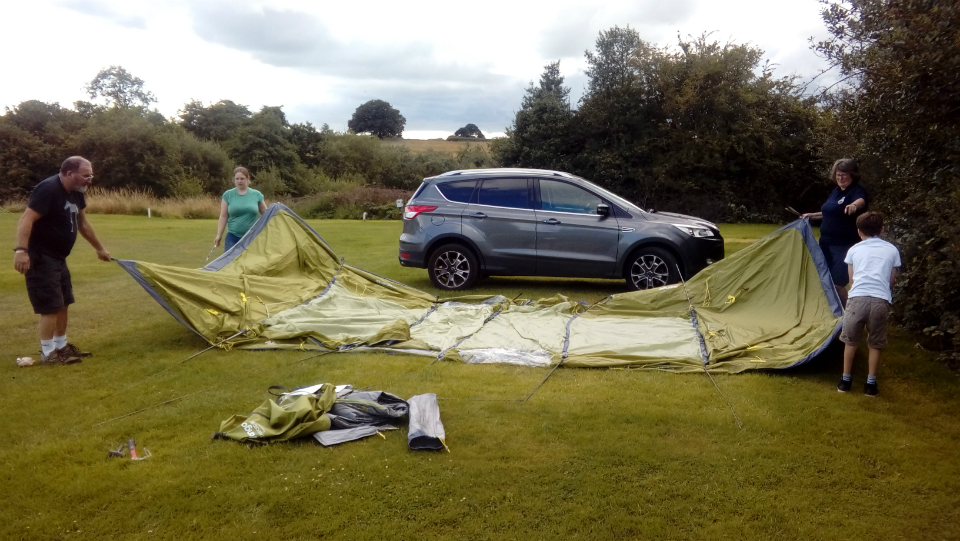Tent going up.