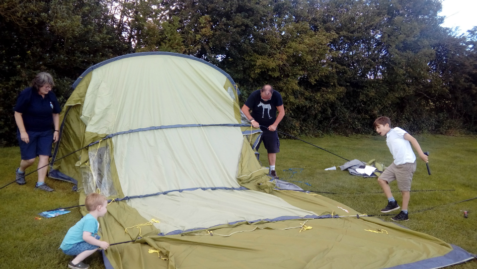 Tent going up.