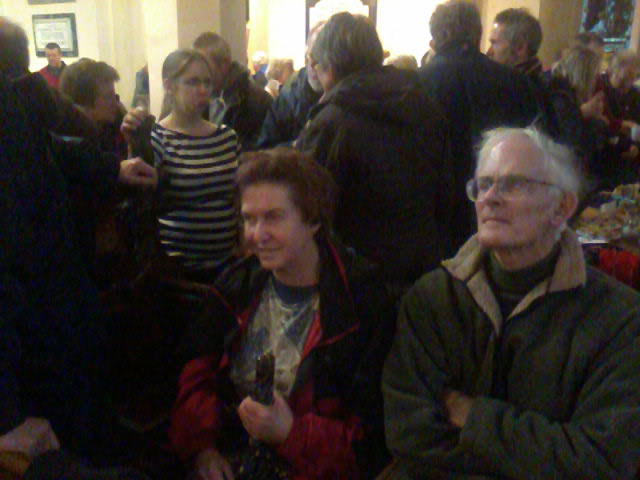 Crowds enjoying refreshments after Christmas ringing in Ipswich.