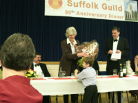 Mason gives flowers to Carolyne Stock.