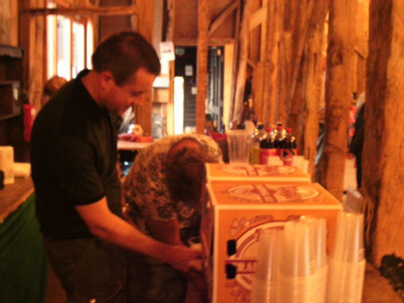 Ralph Earey and Jane behind the bar.