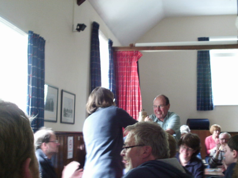 Jenny Scase accepts the Lester Brett Call-Change Trophy on behalf of Debenham.