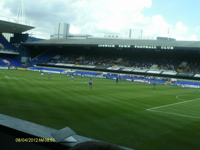 Mason attempts to photograph the game.