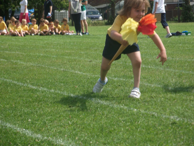 Carrying the Olympic Torch.