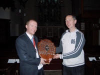 Picture of The Mitson Shield being presented to Mike Whitby of Pettistree by the Guild Ringing Master, Richard J Munnings
