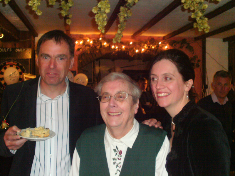 The happy couple with Maggie's mother.