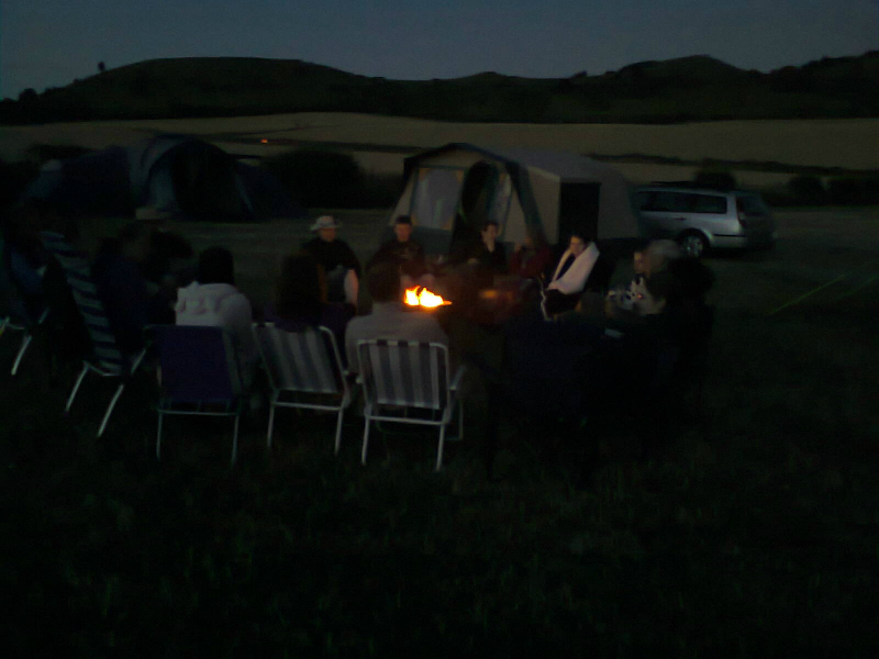 Ramblers sat round the campfire.
