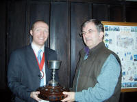 Picture of The Rose Trophy being presented to Owen Claxton of St Mary-le-Tower by the Guild Ringing Master, Richard J Munnings