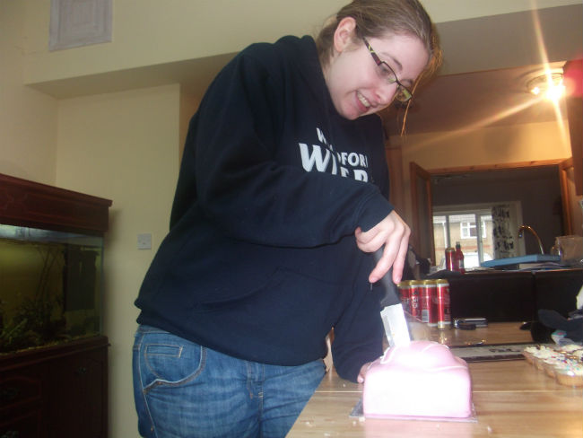 Ruthie gets stuck into her birthday cake.