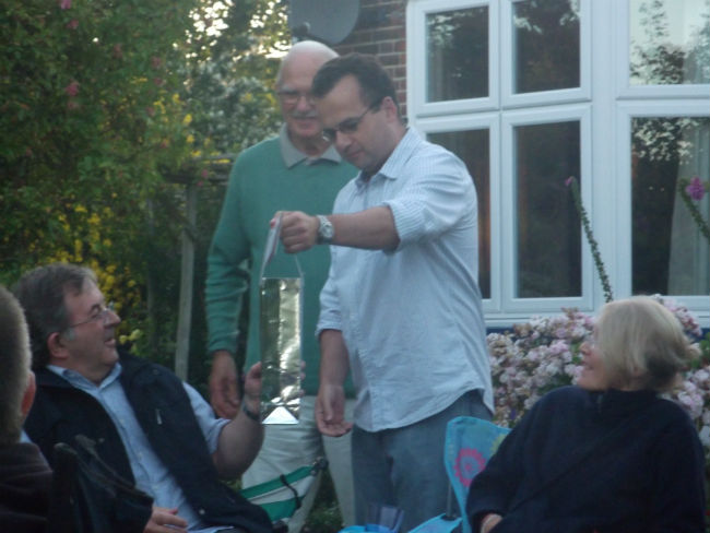 George Pipe & David Potts present Owen Claxton with his gift.