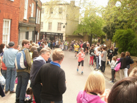 Runners reaching the top of Church Street as they approach the finishing line of the Woodbridge 10k.